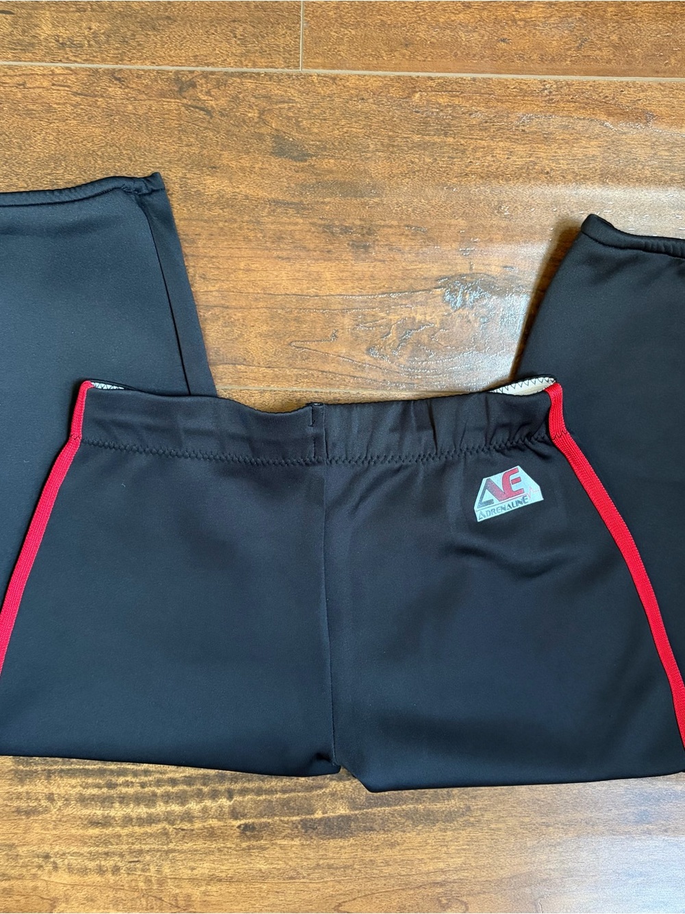 Adrenaline Youth Black Softball Pants with red piping